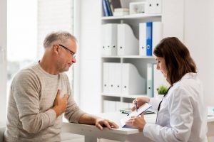 Man talking to Doctor about Leg Bag