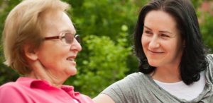 senior-with-dementia-incontinence-and-carer