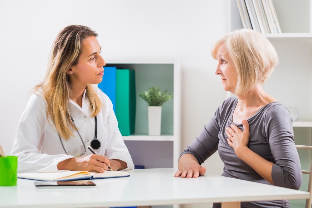 woman-with-doctor-concerned-ovarian-cancer