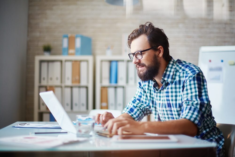 man-googling-online-light-incontinence-pads